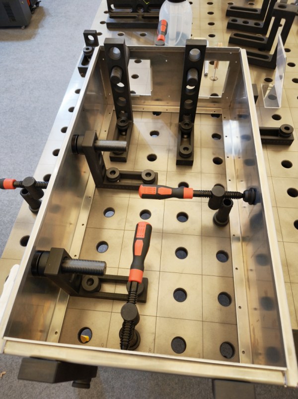 A SWJIG 3D welding table provides a stable, precise platform for metal sheet welding, enabling accurate alignment and strong joints. Its modular design with a 50mm hole system allows flexible fixture placement, improving efficiency and consistency in welding sheet metal parts for various industrial applications.