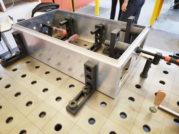 Bolts on a SWJIG 3D welding table securely fasten fixtures and components, providing stable positioning during welding. Their strong hold prevents movement and distortion, ensuring precise welds and improved safety. Easy to adjust and reposition, bolts enhance the flexibility and efficiency of metal fabrication processes.